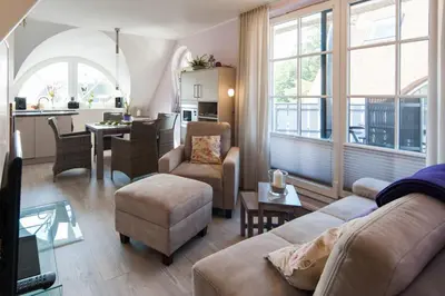 Ein Sitzbereich in der Unterkunft Ferienwohnung No5 Rämel 20