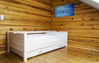 Ein Bett oder Betten in einem Zimmer der Unterkunft Ferienhaus Boddenschwalbe