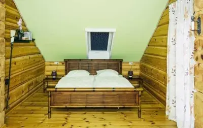Ein Bett oder Betten in einem Zimmer der Unterkunft Ferienhaus Boddenschwalbe