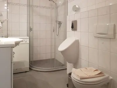 Ein Badezimmer in der Unterkunft An der Stems 3d FeWo 1
