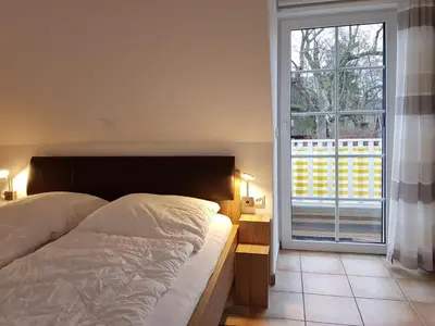 Ein Bett oder Betten in einem Zimmer der Unterkunft An der Stems 3d FeWo 4