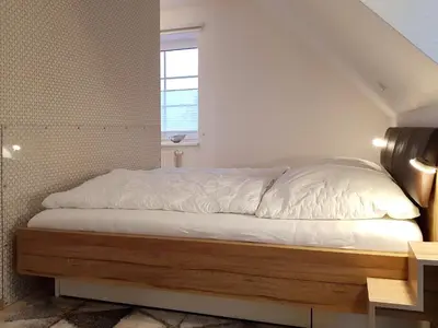 Ein Bett oder Betten in einem Zimmer der Unterkunft An der Stems 3d FeWo 4
