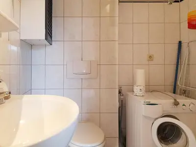 Ein Badezimmer in der Unterkunft Das Gelbe vom Darss 7