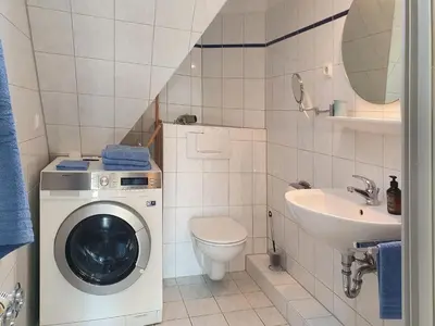 Ein Badezimmer in der Unterkunft Das Gelbe vom Darss 8