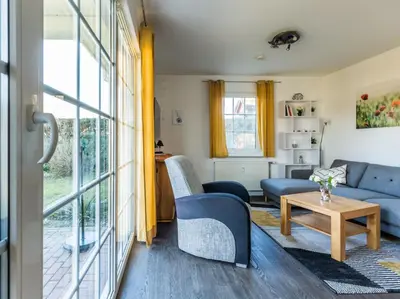 Ein Sitzbereich in der Unterkunft Dat gele Hus FeWo 1