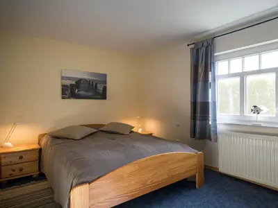 Ein Bett oder Betten in einem Zimmer der Unterkunft Hafenblick 1