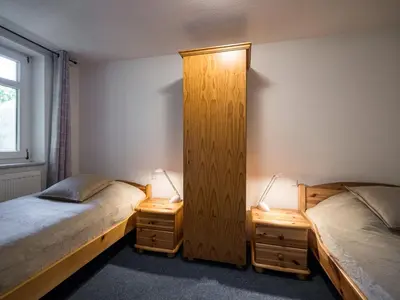 Ein Bett oder Betten in einem Zimmer der Unterkunft Hafenblick 1