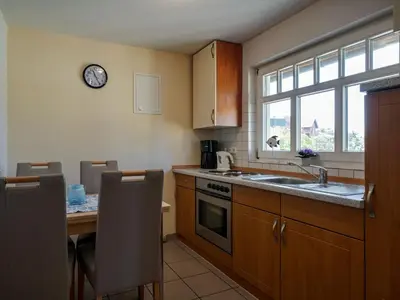 Küche/Küchenzeile in der Unterkunft Hafenblick Ferienhaus
