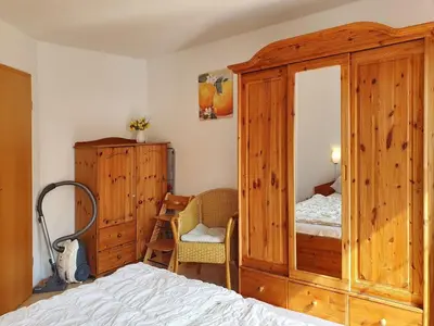 Ein Bett oder Betten in einem Zimmer der Unterkunft Romantischer Winkel Fewo 60b 4