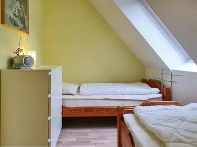 Ein Bett oder Betten in einem Zimmer der Unterkunft Ruh dich aus - Eichenpark Wg 2 4