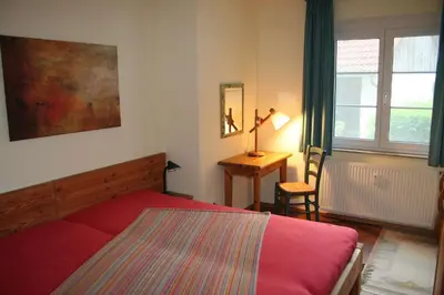 Ein Bett oder Betten in einem Zimmer der Unterkunft Swaantje-Kormoran Q3