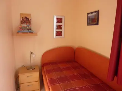 Ein Bett oder Betten in einem Zimmer der Unterkunft Holiday apartment Eulenspiegel