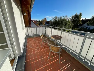 Ein Balkon oder eine Terrasse in der Unterkunft Haus Admiral mit Garten, 5 Gehminuten zum Strand, inklusive WLAN, Sauna, Kamin, Tischtennisplatte, Bollerwagen für den Strand