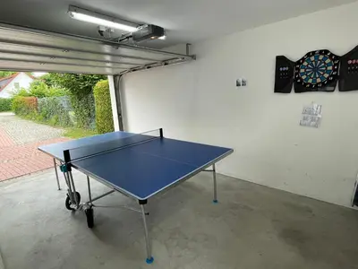 Tischtennis in der Unterkunft Haus Admiral mit Garten, 5 Gehminuten zum Strand, inklusive WLAN, Sauna, Kamin, Tischtennisplatte, Bollerwagen für den Strand oder in der Nähe