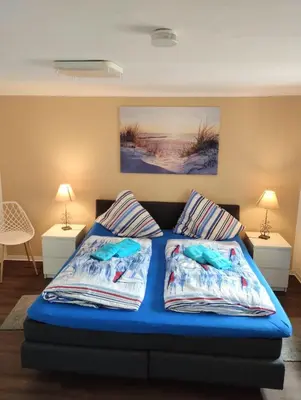 Ein Bett oder Betten in einem Zimmer der Unterkunft Huus am Darß