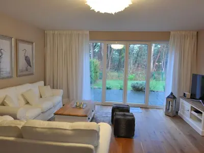 Ein Sitzbereich in der Unterkunft Holiday house dune forest b
