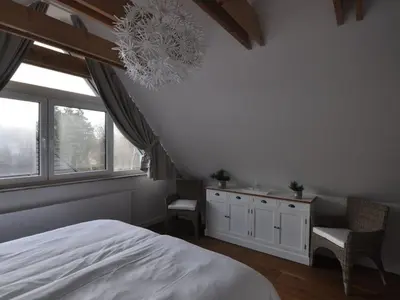 Ein Bett oder Betten in einem Zimmer der Unterkunft Holiday house dune forest b