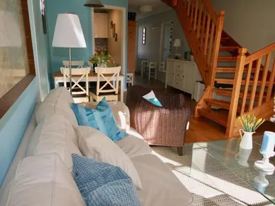 Ein Sitzbereich in der Unterkunft Holiday home Marla Comfortable Vacation Home