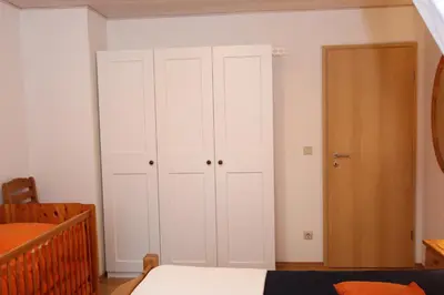 Ein Bett oder Betten in einem Zimmer der Unterkunft Bullerbü 2