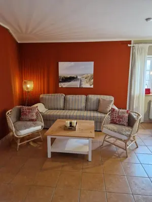Ein Sitzbereich in der Unterkunft Ferienhaus am Saaler Bodden