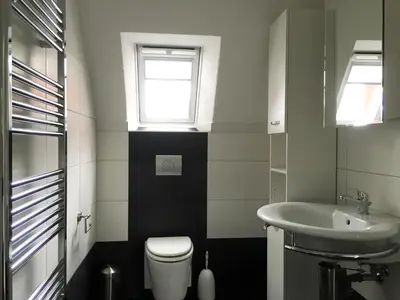 Ein Badezimmer in der Unterkunft FeWo ZENO III