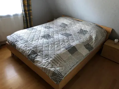 Ein Bett oder Betten in einem Zimmer der Unterkunft FeWo ZENO II