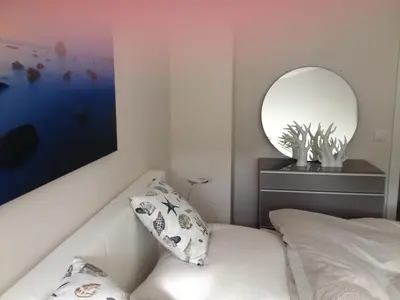 Ein Bett oder Betten in einem Zimmer der Unterkunft Haus ZingstZeit