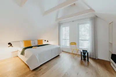 Ein Bett oder Betten in einem Zimmer der Unterkunft Aloha Pruchten