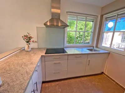 Küche/Küchenzeile in der Unterkunft Seeschwälbchen - Ihr Ferienhaus am Ostseestrand