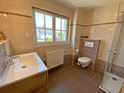 Ein Badezimmer in der Unterkunft Seeschwälbchen - Ihr Ferienhaus am Ostseestrand