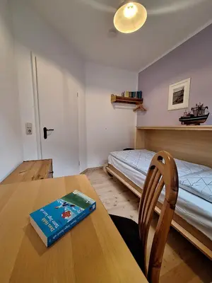 Ein Bett oder Betten in einem Zimmer der Unterkunft Birkenstr 14 Timeout Oasis