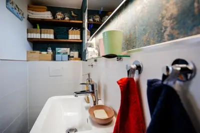 Ein Badezimmer in der Unterkunft Prima Camping Resort Boddenblick -Stellplätze-Schlaffässer-Tiny Houses in Ostsee Nähe