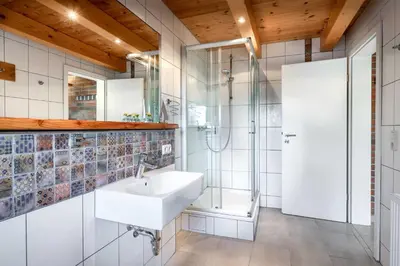 Ein Badezimmer in der Unterkunft Ostseelandhaus mit Südterrasse und Teich OFC 07
