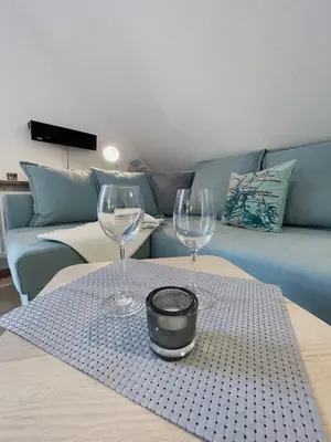 Ein Sitzbereich in der Unterkunft Ferienwohnung Meerverliebt