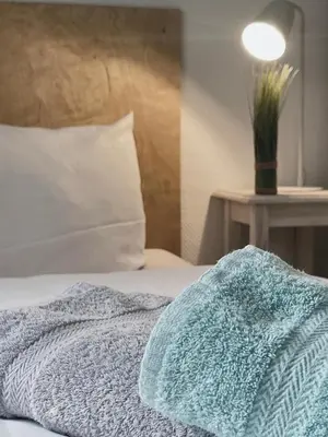 Ein Bett oder Betten in einem Zimmer der Unterkunft Ferienwohnung Meerverliebt