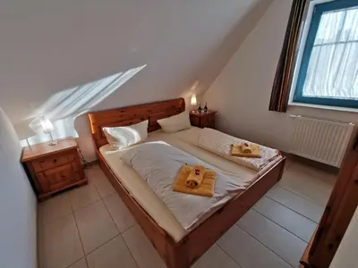 Ein Bett oder Betten in einem Zimmer der Unterkunft LandBrise