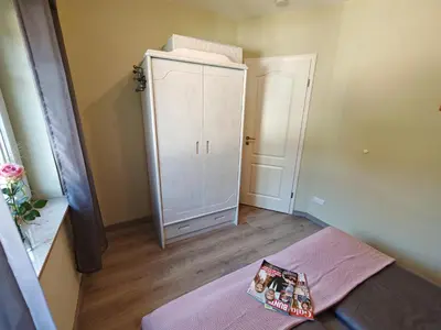 Ein Bett oder Betten in einem Zimmer der Unterkunft SeemannsLiebe