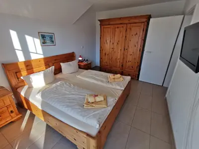 Ein Bett oder Betten in einem Zimmer der Unterkunft SteuerbordBrise