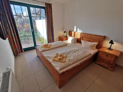 Ein Bett oder Betten in einem Zimmer der Unterkunft MeeresBrise