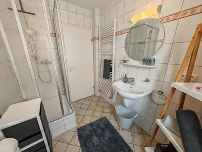 Ein Badezimmer in der Unterkunft KüstenLiebe