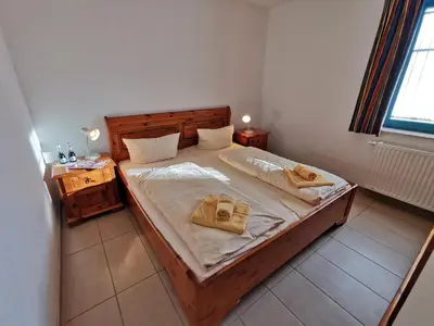 Ein Bett oder Betten in einem Zimmer der Unterkunft SommerBrise