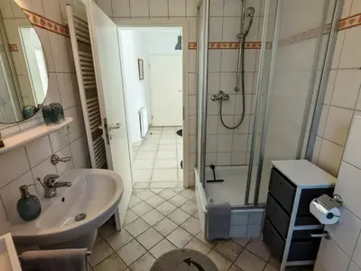 Ein Badezimmer in der Unterkunft StrandLiebe