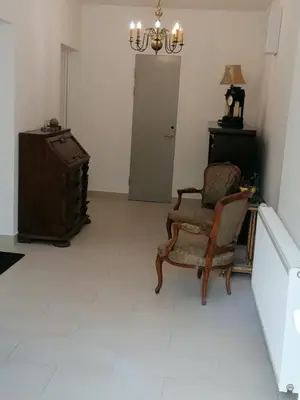 Ein Sitzbereich in der Unterkunft Ferienwohnung 1 Landhaus Thätner