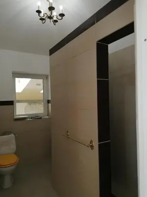 Ein Badezimmer in der Unterkunft Ferienwohnung 1 Landhaus Thätner