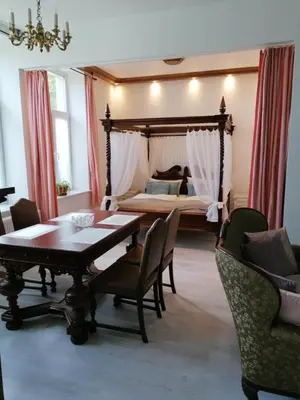 Ein Sitzbereich in der Unterkunft Ferienwohnung 1 Landhaus Thätner