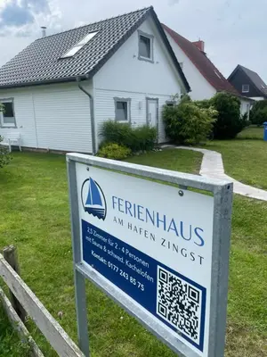 Ein Zertifikat, Auszeichnung, Logo oder anderes Dokument, das in der Unterkunft Ferienhaus am Hafen Zingst ausgestellt ist