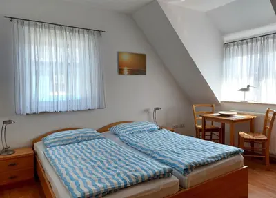 Ein Bett oder Betten in einem Zimmer der Unterkunft Meerglück - Ferienhaus mit gehobener Ausstattung