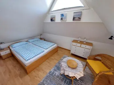 Ein Bett oder Betten in einem Zimmer der Unterkunft Meerglück - Ferienhaus mit gehobener Ausstattung