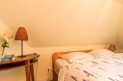 Ein Bett oder Betten in einem Zimmer der Unterkunft Malergarten 23