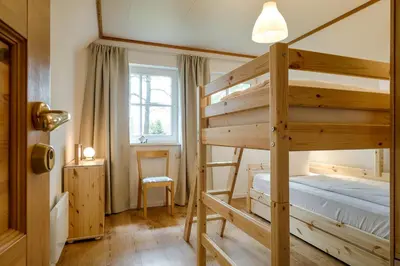 Ein Bett oder Betten in einem Zimmer der Unterkunft Sandsturm